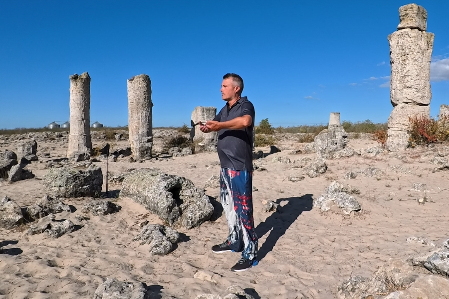 Person performing Qigong with mystical energy flow
